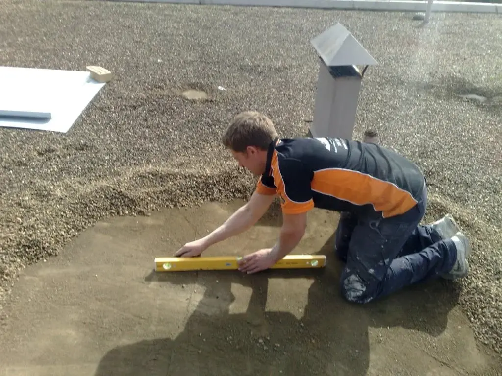 Preparing for a hatch, Levelling a cleared patch of roof.