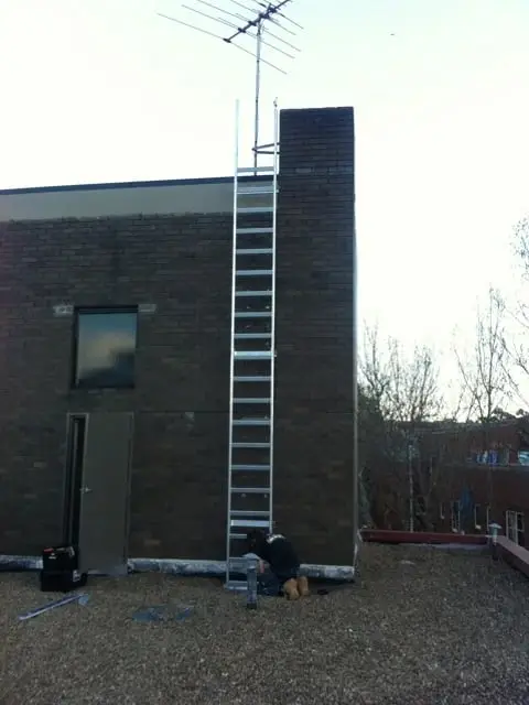 Replacement ladder, New aluminium ladder on the wall.