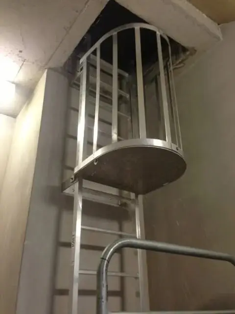 Caged ladder, Caged ladder up to a roof opening.
