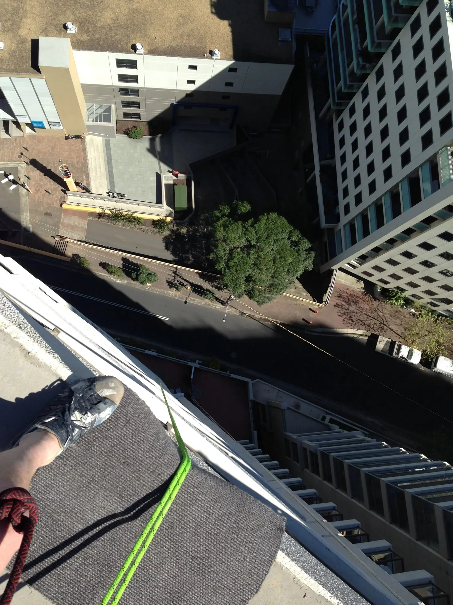 View straight down the tower from a technician's rope during window cleaning, Peninsula Tower, Milsons Point