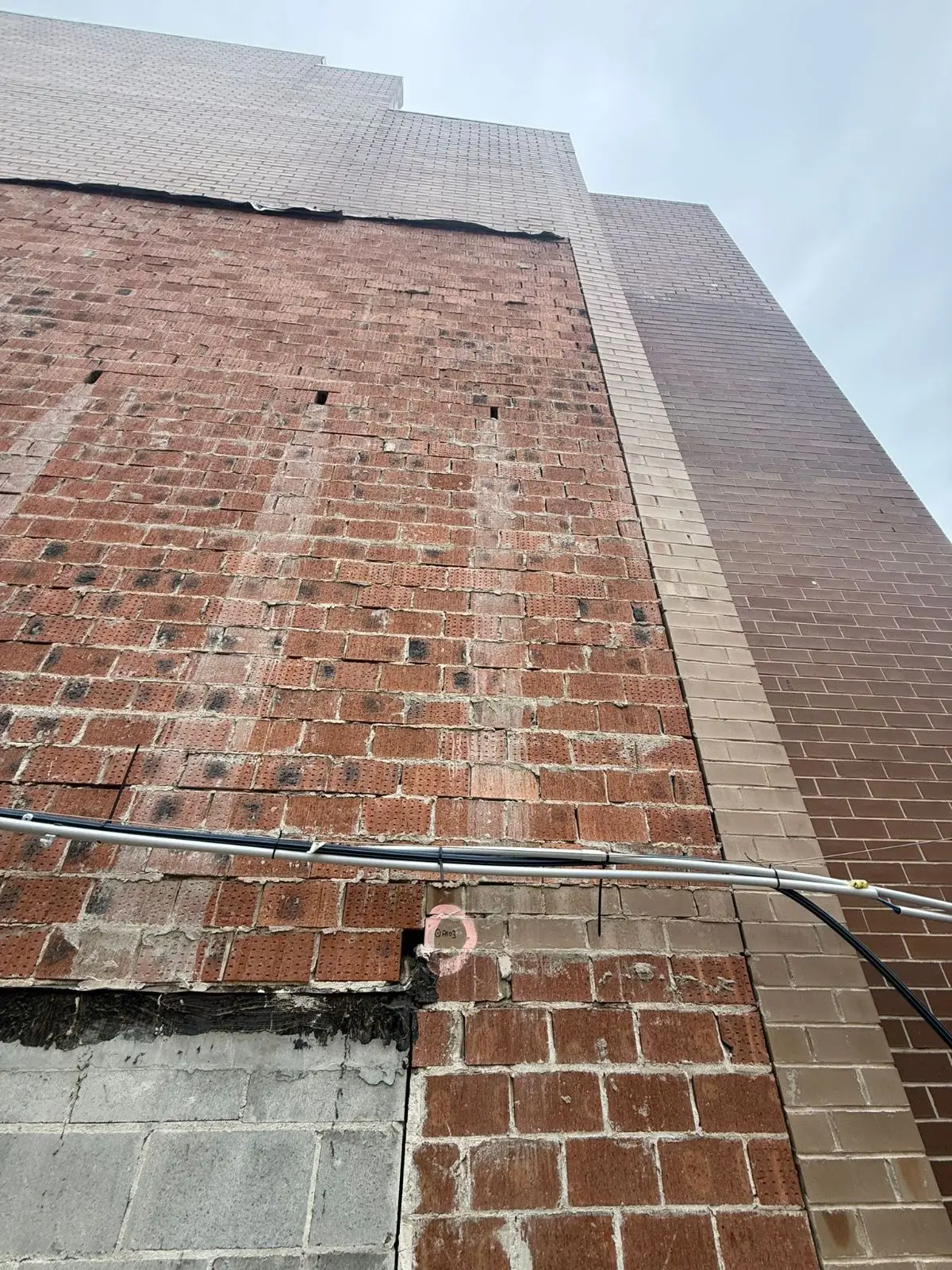 Before: weathered brickwork, Brooklyn, Cornwallis St · 2026