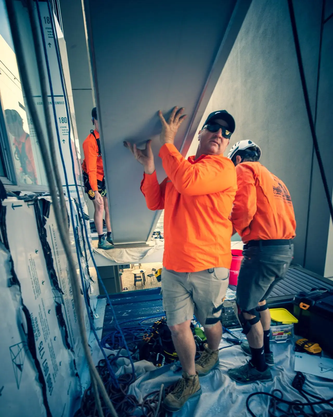 Lifting a panel into place, Building D · 2021