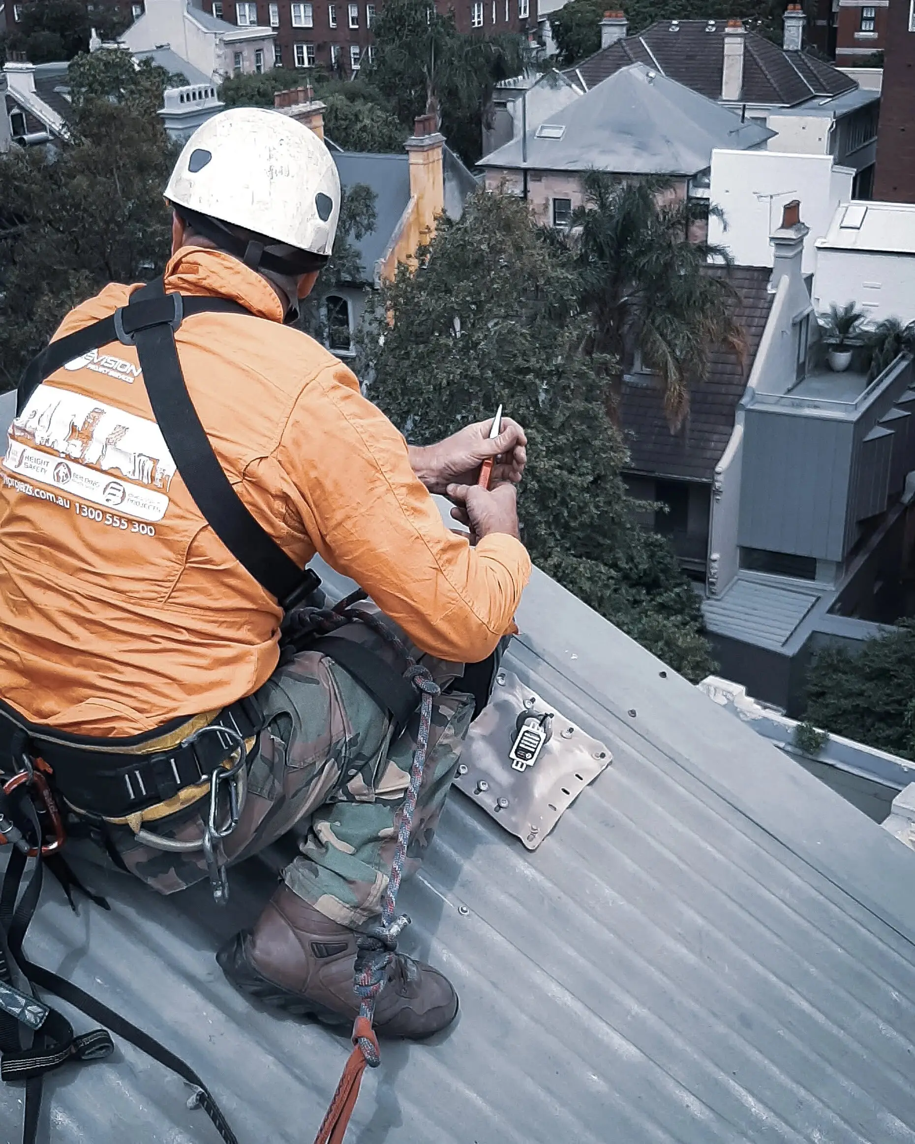 Rigging on a metal roof, Crew photo shoot, 2020