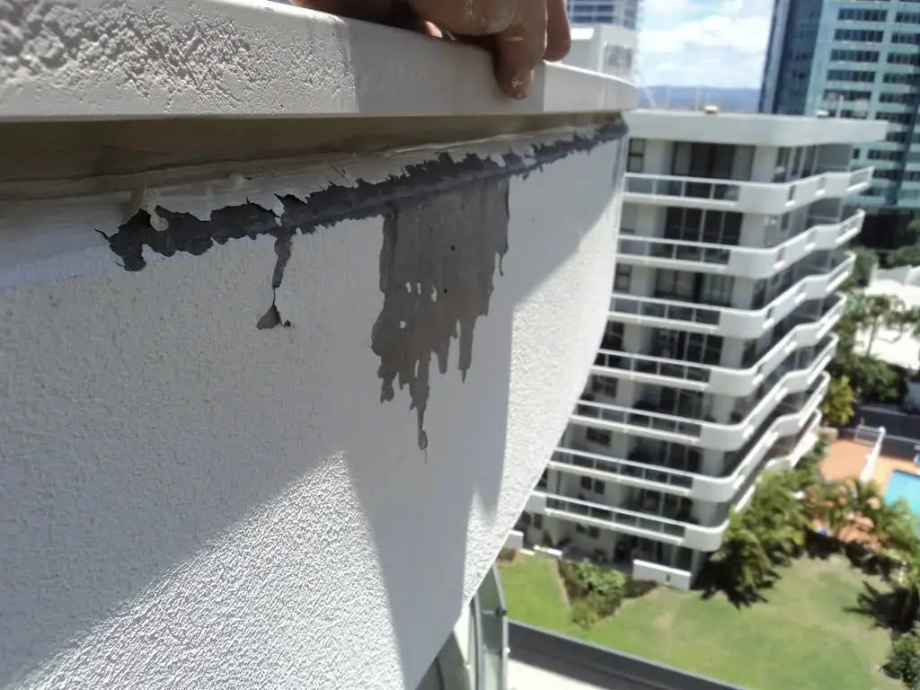 Delaminated paint on the slab ends, Jade Apartments · 2011–12
