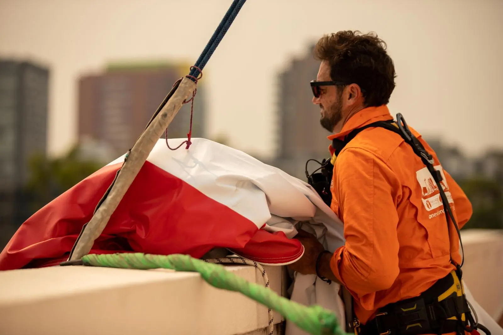 Rigging a building banner, 55 Pyrmont Bridge Rd, Pyrmont