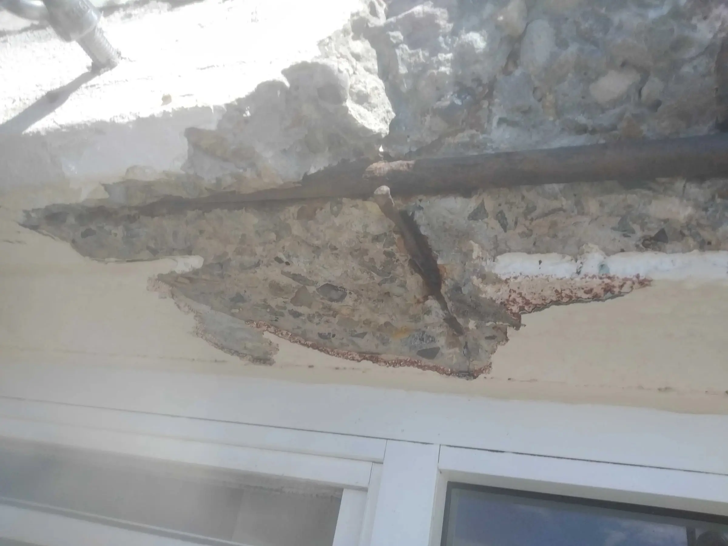Spalling concrete with exposed reinforcement, Cronulla · 2019